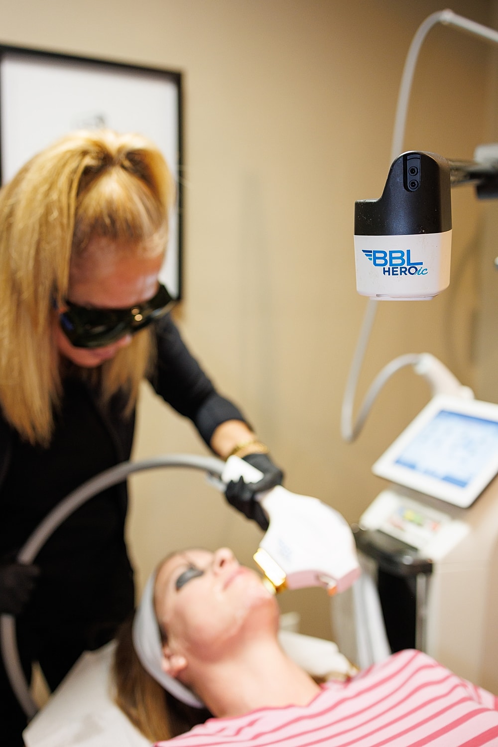 Young woman with natural makeup and soft expression.